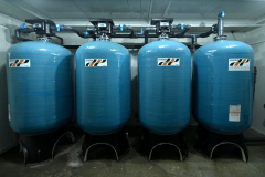 Iron- and manganese removal system for municipal water treatment